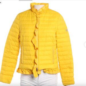 Red Escada quilted jacket for women.